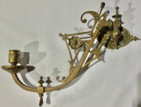A Victorian Aesthetic Movement brass wall light