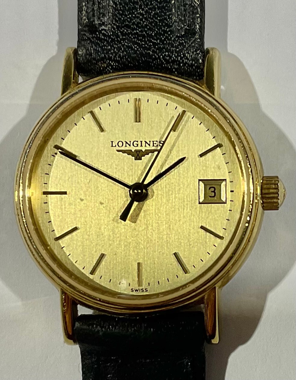 A lady's Longines gold plated stainless steel watch, Champagne dial, baton indicators, centre - Image 2 of 3