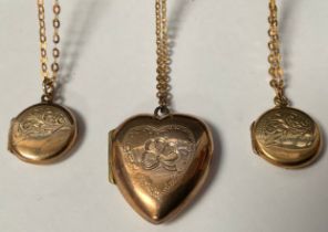 A 9ct gold chain with gold plated heart shaped locket, two 9ct gold chains with gold plated circular
