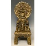 A 'bronzed' gilt metal figure of Buddha Shakyamuni, seated, 29.5cm high