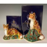 A pair of Royal Crown Derby paperweights, Vixen and Fox Cub, gold stoppers, the Vixen 14.5cm high,