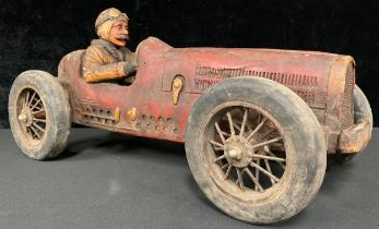 Motoring Interest - a decorative model of a car and driver