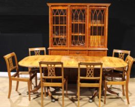 A contemporary 19th century style yew veneer library bookcase or display cabinet, 196.5cm high,