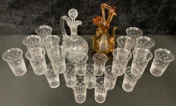 An amber glass oil and vinegar bottle; an Edwardian engraved clear glass decanter; assorted acid