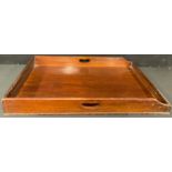 A large mahogany butlers tray, Harrods label, 82cm long, 54cm wide