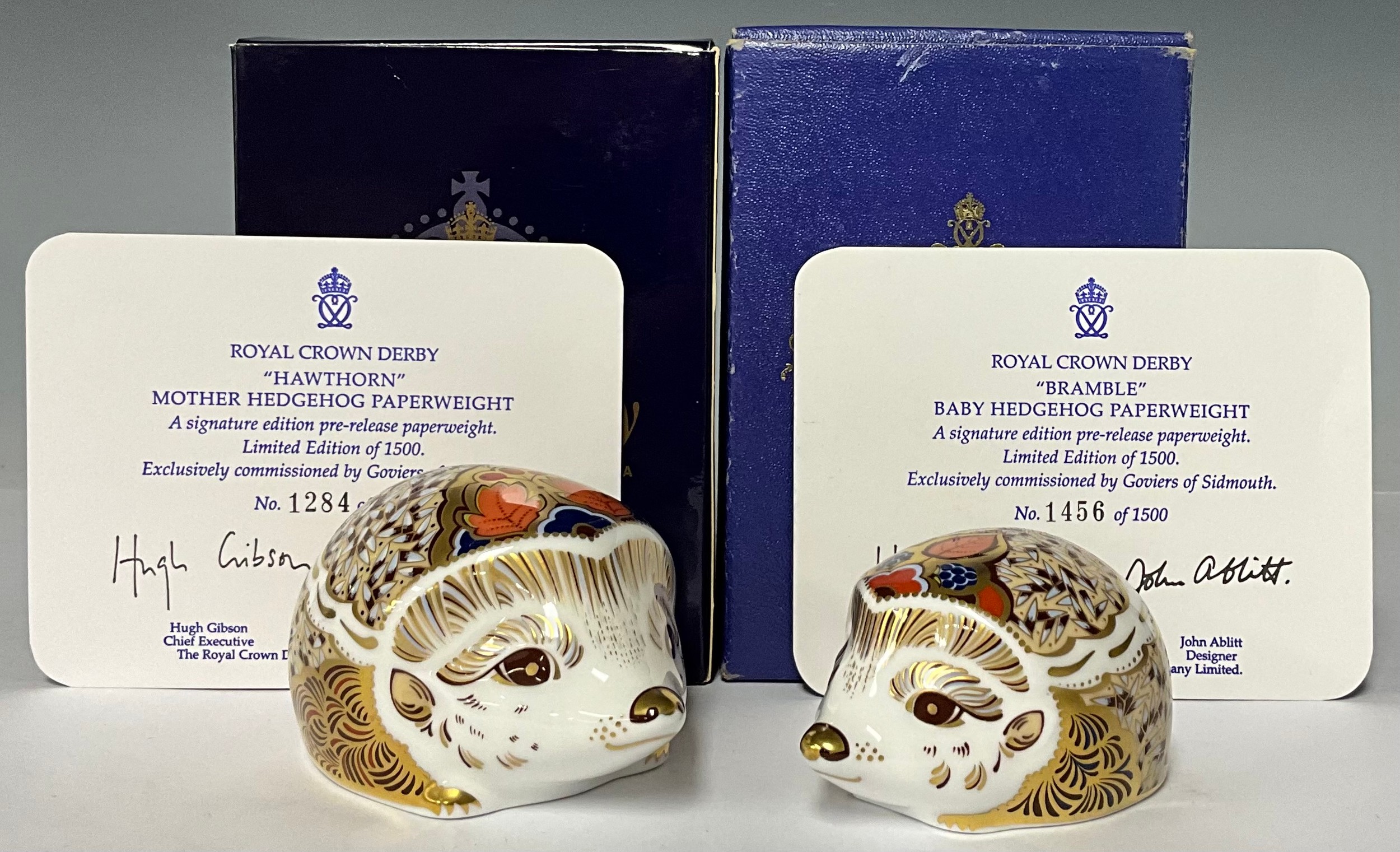 An associated pair of Royal Crown Derby paperweights, Hawthorn Mother Hedgehog, 9.5cm wide and