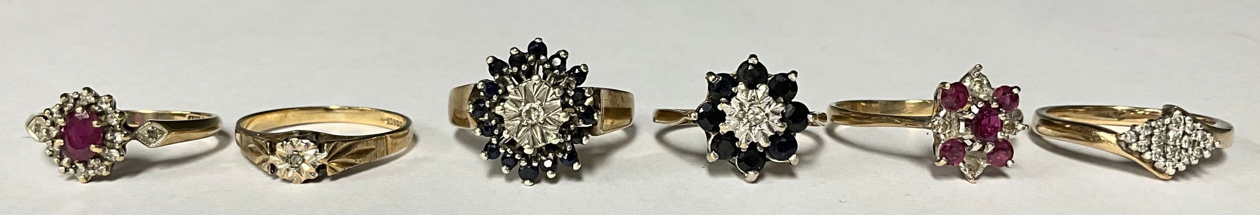 A 9ct gold diamond and sapphire flower head cluster ring, size P, marked 375, 4.2g; five other 9ct