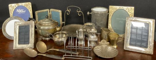 Plated ware - An EPNS teapot, other plated and metal ware including a Ronson style desk lighter,