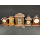 Clocks - a late 19th/eary 20th century oak bracket type mantel clock, 48cm high; a W.E. Watts,