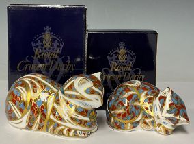 A Royal Crown Derby paperweight, Contented Cat, gold stopper, boxed; another, Sleepy Kitten, gold