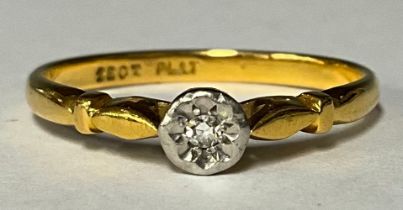 A 22ct gold diamond solitaire ring, the stone illusion set in platinum bezel, size P, 2.9g, boxed
