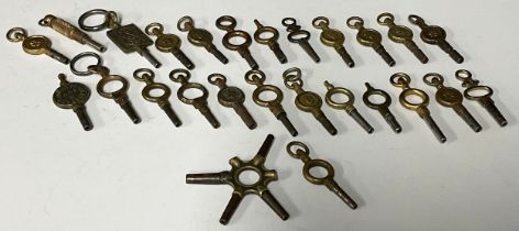 A collection of pocket watch keys, some advertising, qty