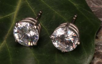 A large pair white stone stud earrings, the round brilliant cut stones possibly tourmaline, 9mm in