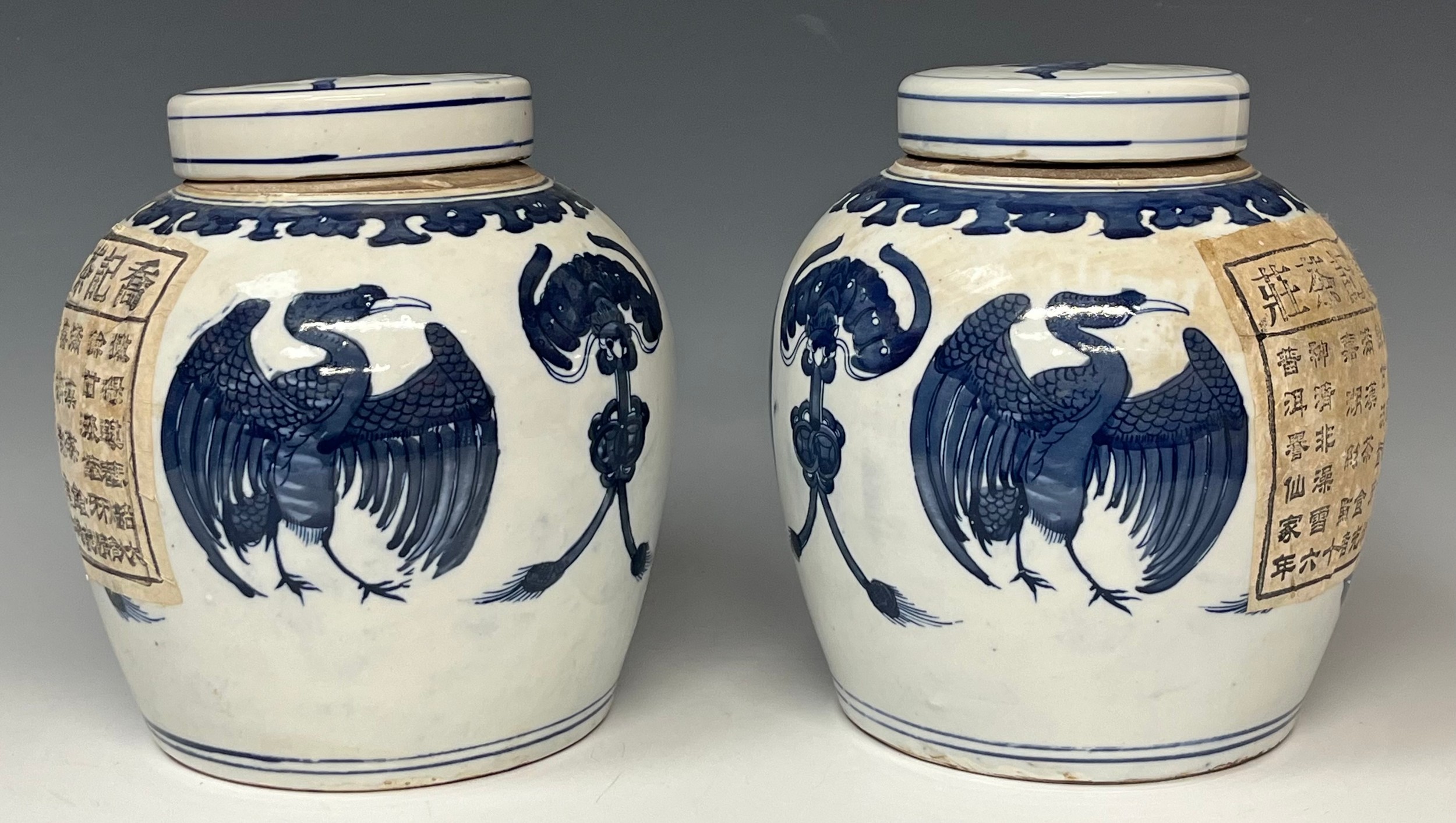 A pair of contemporary Chinese Export ware blue and white ginger jars and covers, each decorated