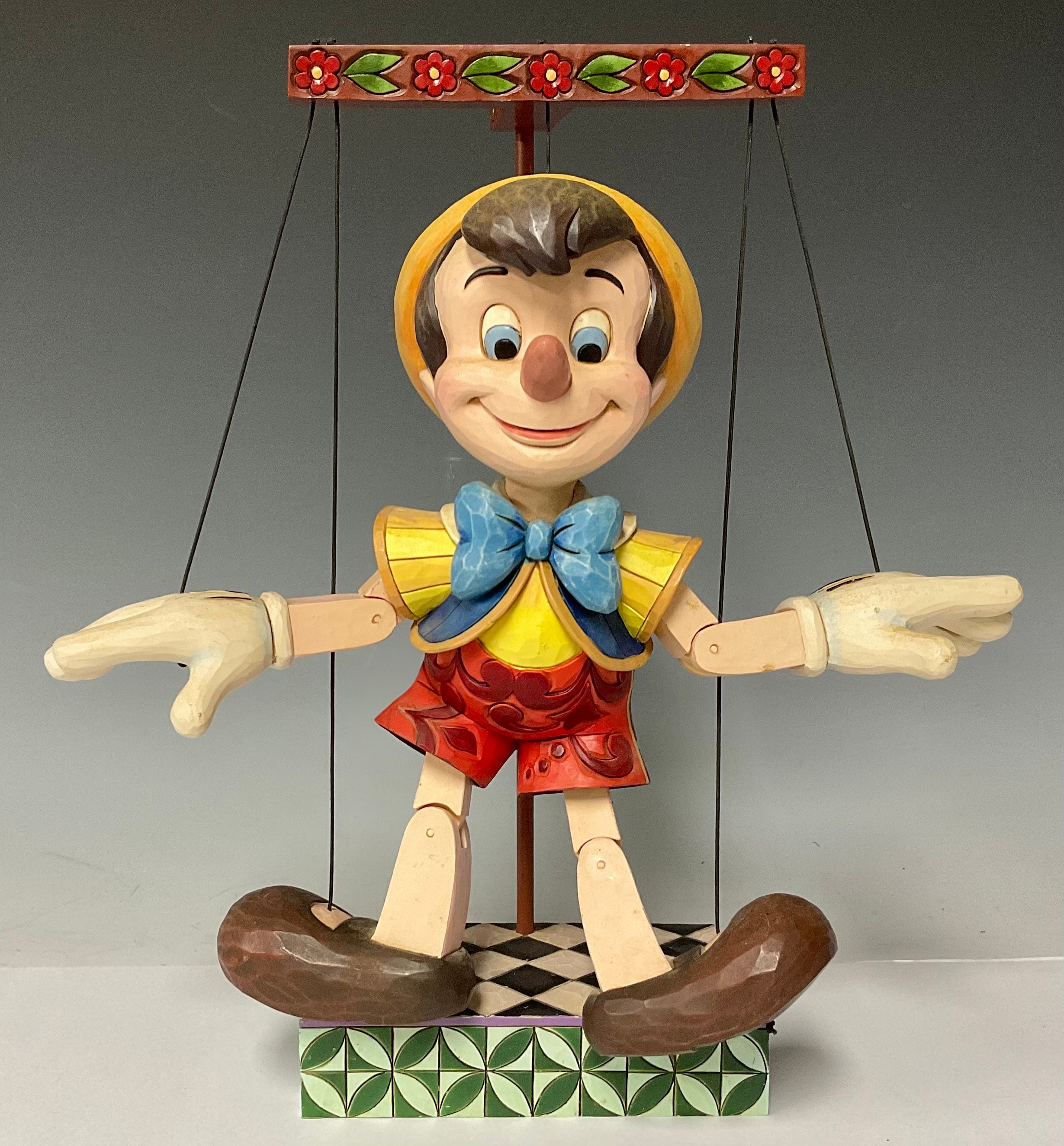 A Walt Disney Showcase model, Pinocchio, 70 Years of Wishing On A Star, resin puppet model on stand,