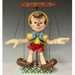 A Walt Disney Showcase model, Pinocchio, 70 Years of Wishing On A Star, resin puppet model on stand,