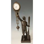 A bronzed metal mystery clock modelled as an aviator, approx. 38.5cm high