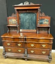 A late Victorian mahogany drawing room or parlour cabinet, the back applied with bevelled mirror
