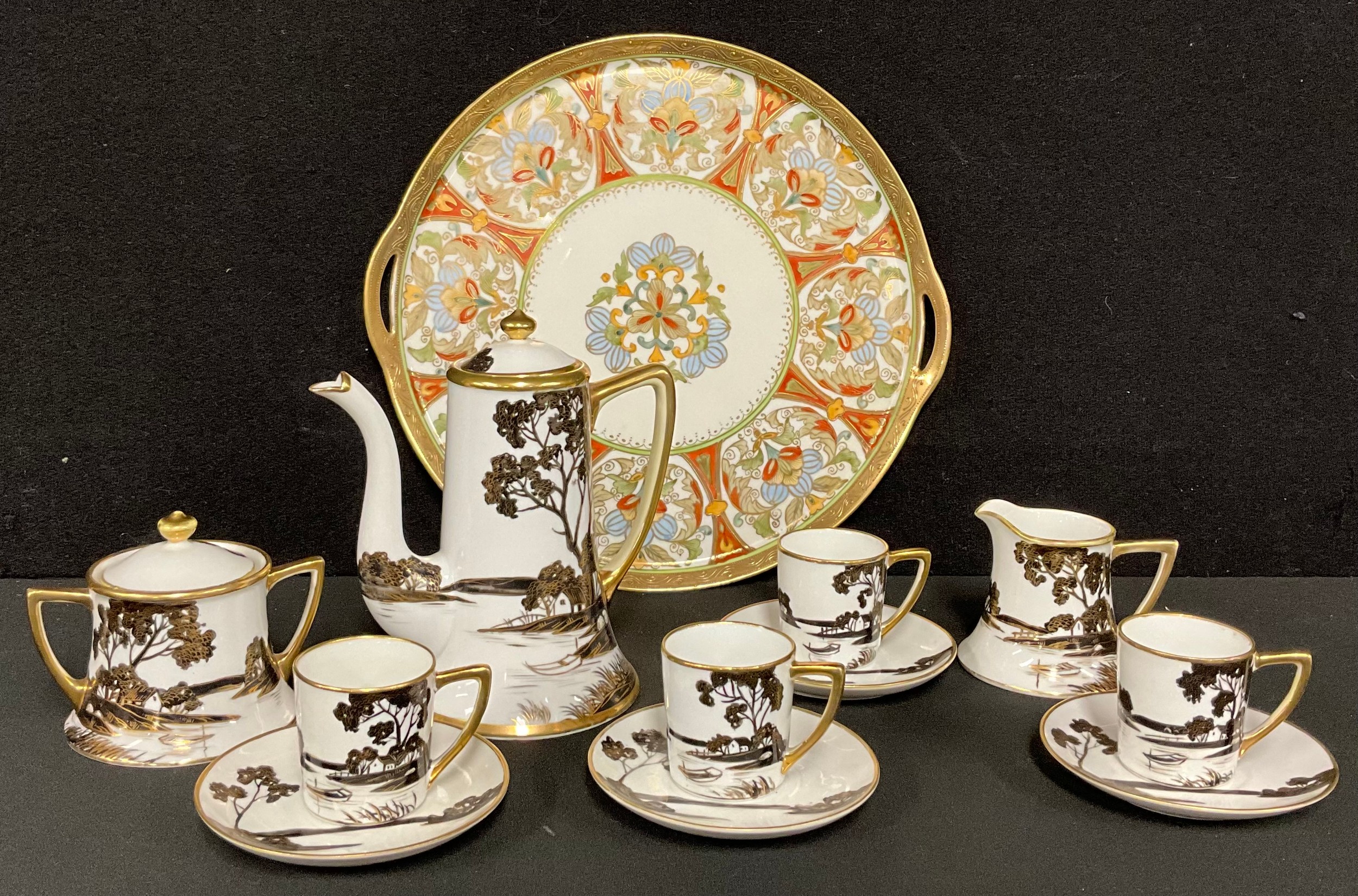A Noritake coffee set, printed in monochrome, coffee pot, four coffee cans and saucers, cream jug
