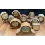 Clocks - early to mid 20th century tambour mantel clocks, various makers, timbers and forms (10)