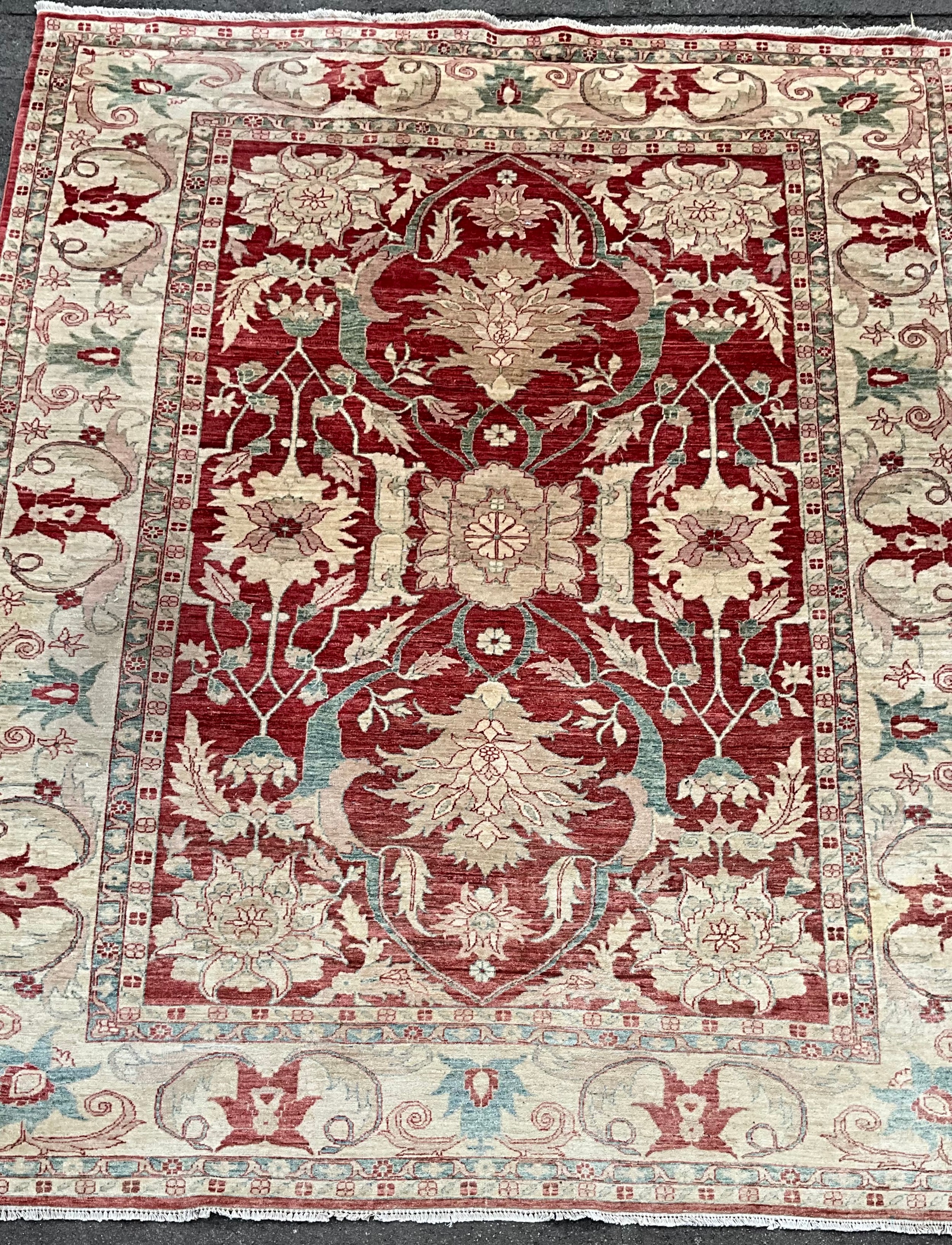 An Indian design Agra type wool rug or carpet, 363cm x 277cm
