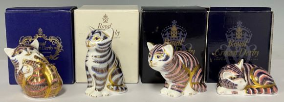 A set of three Royal Crown Derby paperweights, Playful Kitten, Sleeping Kitten and Sitting Kitten,
