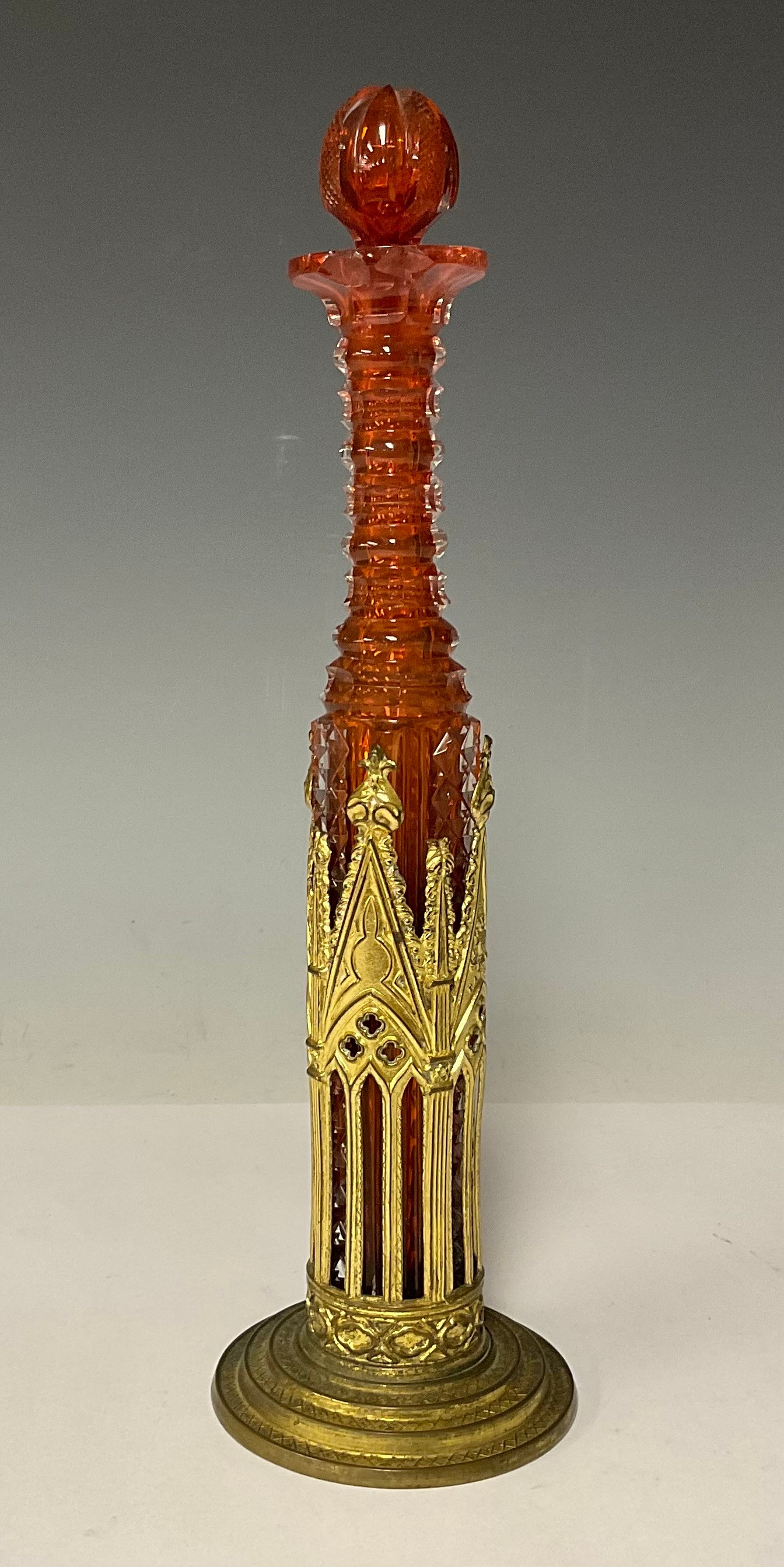 A late 19th century gilt metal "Day's Patent Chimney Vase, To Represent Gothic Architecture...",