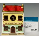 A Royal Crown Derby miniature model, The Longest Reign Pub, commemorates HRH Queen Elizabeth