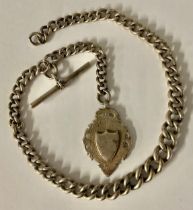 A Victorian silver graduated curb link Albert chain, with T-bar and shield fob, the fob Birmingham