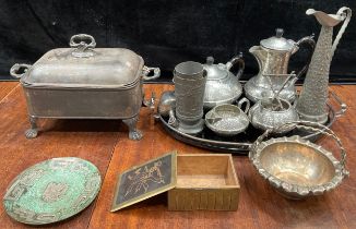 A pewter four piece tea set; a oval glass and EPNS serving tray; a Norwegian pewter ewer; a 19th