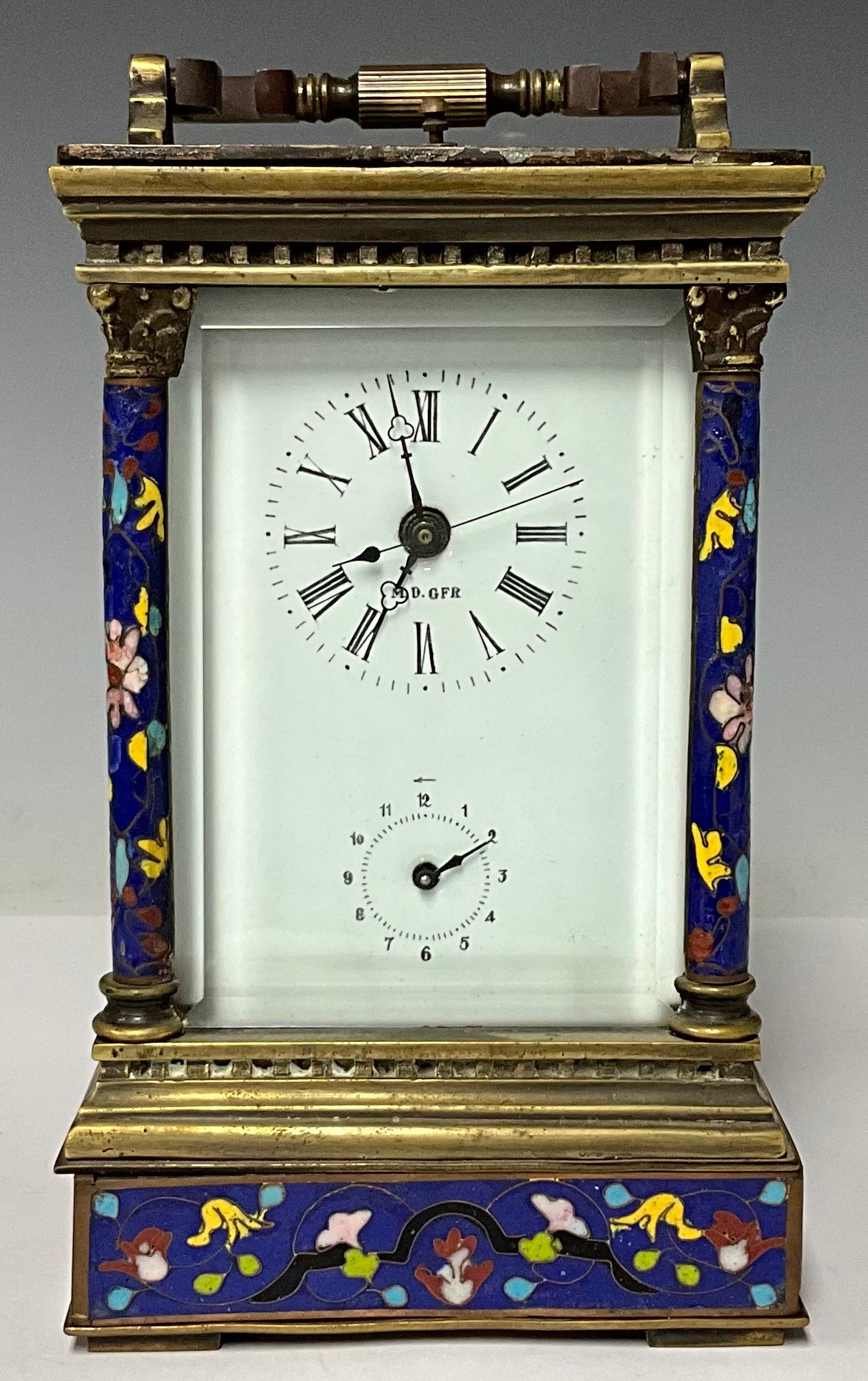 A large cloisonné enamel carriage clock, 19cm high excluding handle