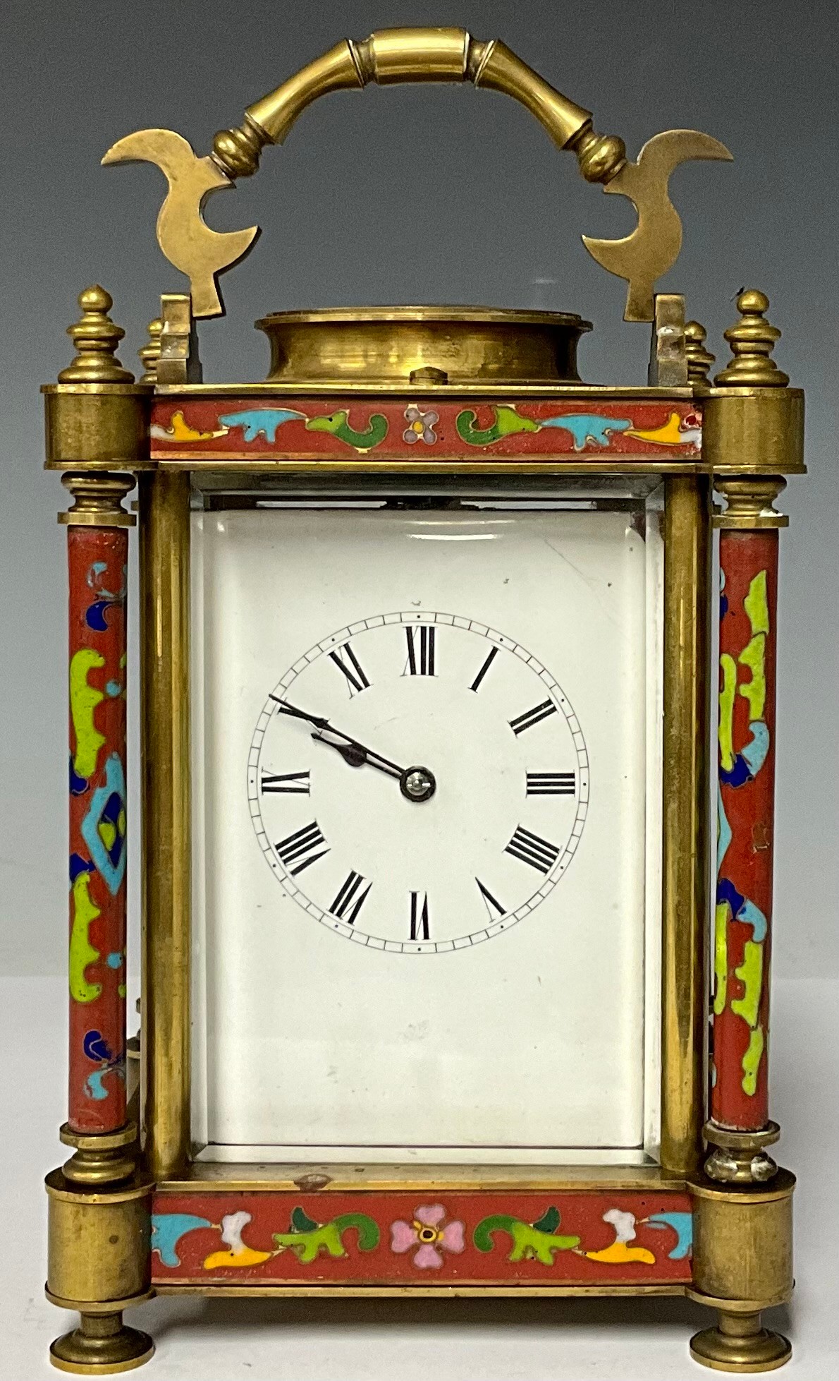 A large cloisonné enamel carriage clock, 17cm high excluding handle