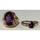 A late 19th/early 20th century 9ct gold dress ring, set with a single faceted amethyst, size M/N,