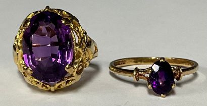 A late 19th/early 20th century 9ct gold dress ring, set with a single faceted amethyst, size M/N,