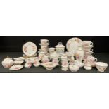 A Royal Crown Derby Posies pattern mantel clock, lobed ovoid vase, set of six teacups, saucers and