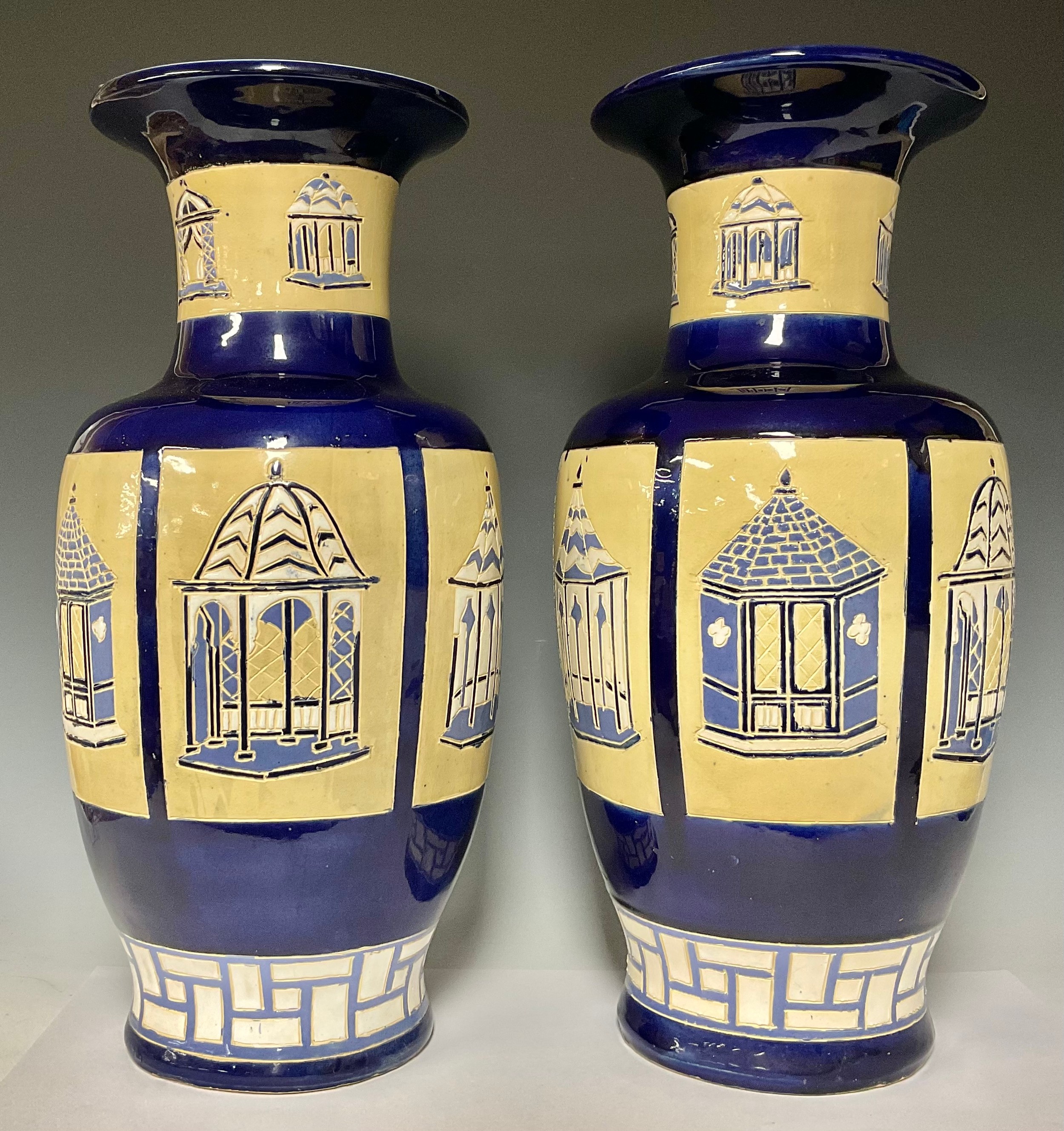 Ceramics - a pair of Brannam Gazebo baluster vases, decorated with six panels, each with a pagoda,