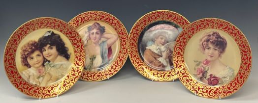 A set of four reproduction pictorial plates, each decorated with a red and gilt border, printed mark