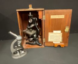 A W Watson & Sons Ltd microscope, Service, serial number 100897, fitted mahogany case with further
