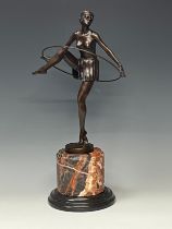 D. Alonzo, after, an Art Deco style bronzed metal hoop dancer, marble base, 48cm high overall
