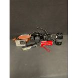 A Minolta Dynax 7 xi 35mm camera, serial number 17131962, with Hoya Skylight (1B) zoom xi 62 mm