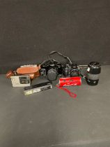 A Minolta Dynax 7 xi 35mm camera, serial number 17131962, with Hoya Skylight (1B) zoom xi 62 mm