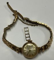 A lady's Bentima 9ct gold watch, Champagne dial, baton indicators, integral 9ct gold bracelet strap,