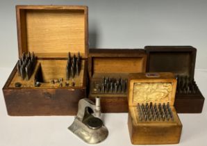 A clockmaker's/watchmaker's staking set, cased; other watchmaking tools, cased (4)
