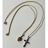 A 9ct gold amethyst cross pendant, 9ct gold necklace chain, marked 375, 2.8g, boxed; a 9ct gold ruby