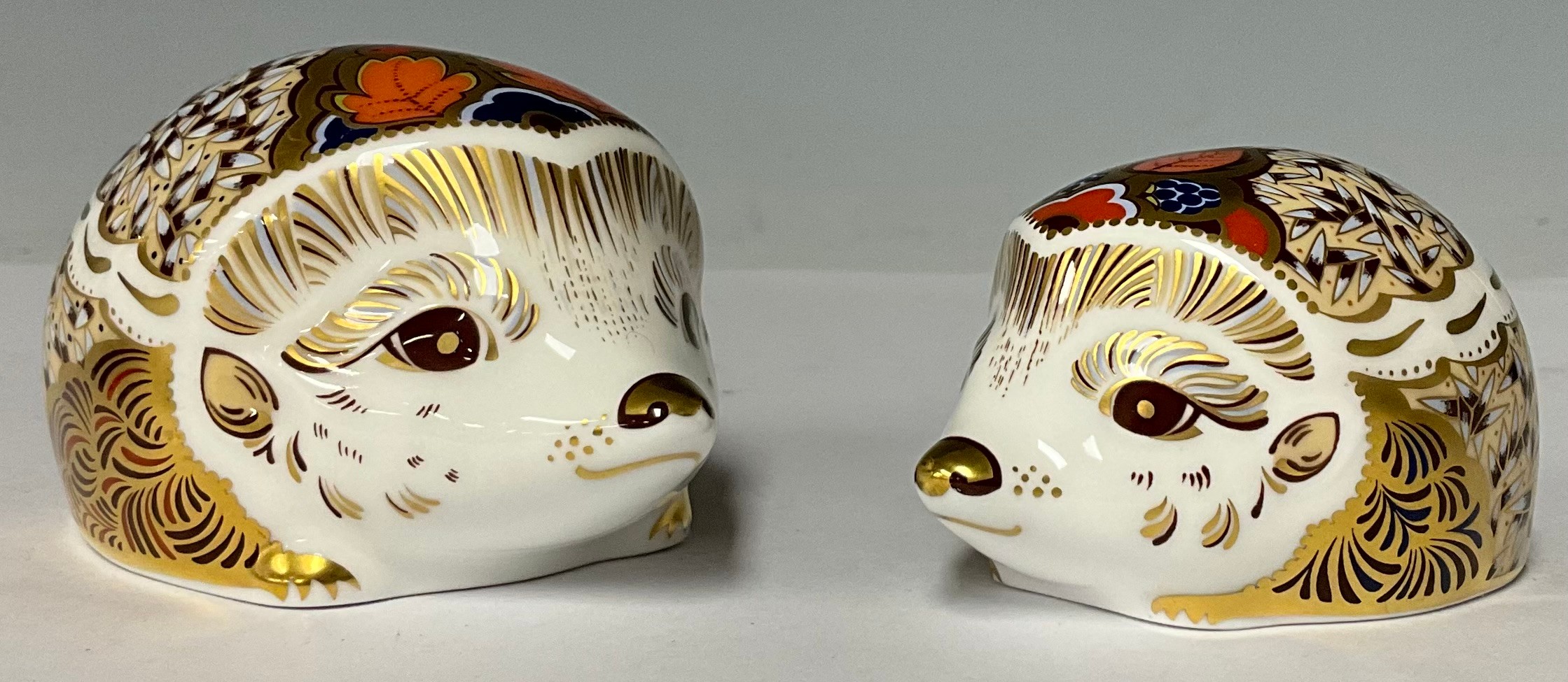 An associated pair of Royal Crown Derby paperweights, Hawthorn Mother Hedgehog, 9.5cm wide and - Image 2 of 2