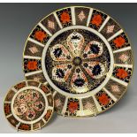 A Royal Crown Derby Imari 1128 pattern dinner plate, 27cm, second; an 1128 circular trinket tray,
