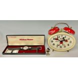 A Walt Disney Productions Mickey Mouse alarm clock, by Bradley, made in Germany, 17.5cm; a Walt