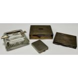 An Elizabeth II silver engine turned cigarette box, hinged cover with monogram, cedar wood lined,