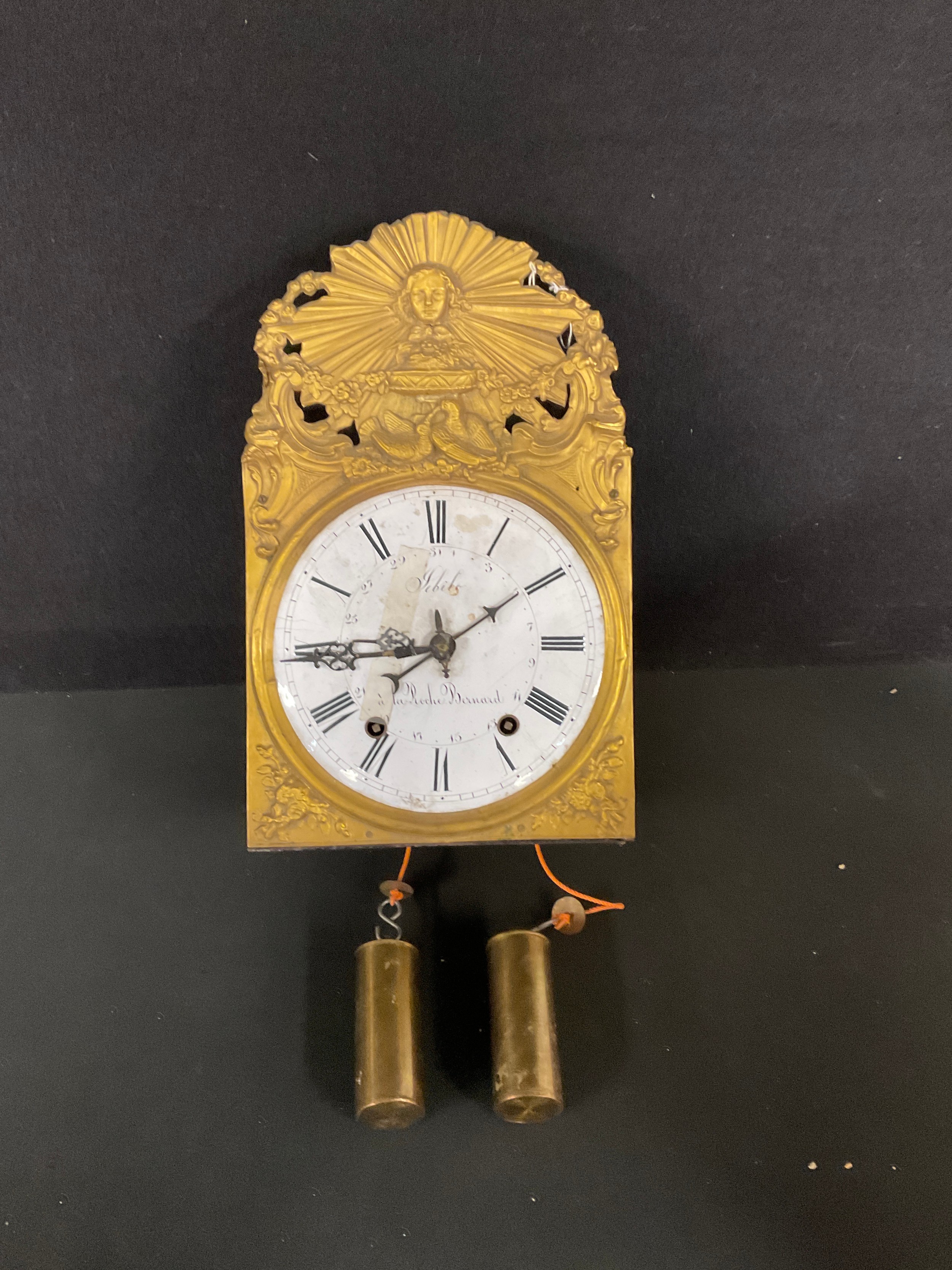 A 19th century French comtoise morbier wall clock, circular white enamel dial inscribed with Roman