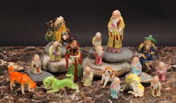 A collection of Chinese Republican porcelain miniature figures, including Shou Lao, immortals,